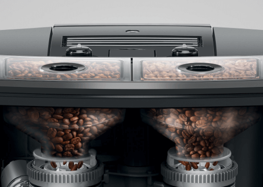 Górna część ekspresu do kawy z dwoma pojemnikami pełnymi ziaren kawy